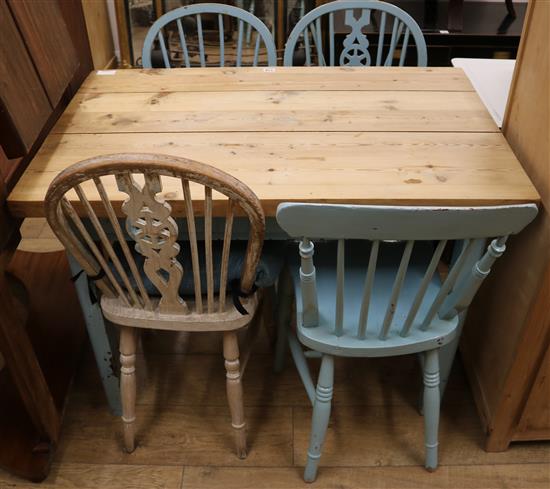 A pine kitchen table and four chairs table W.105cm